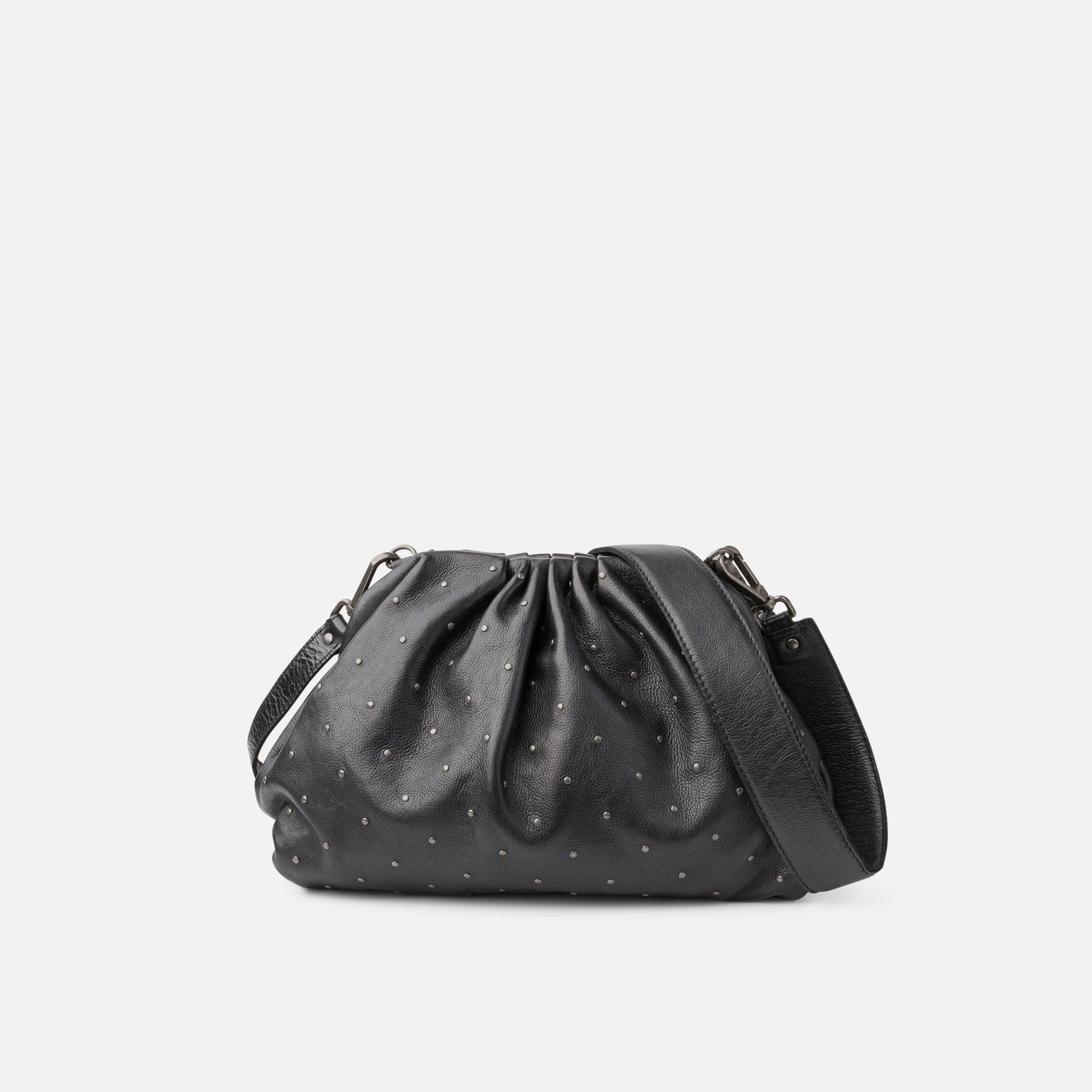 Black textured handbag on a light gray background